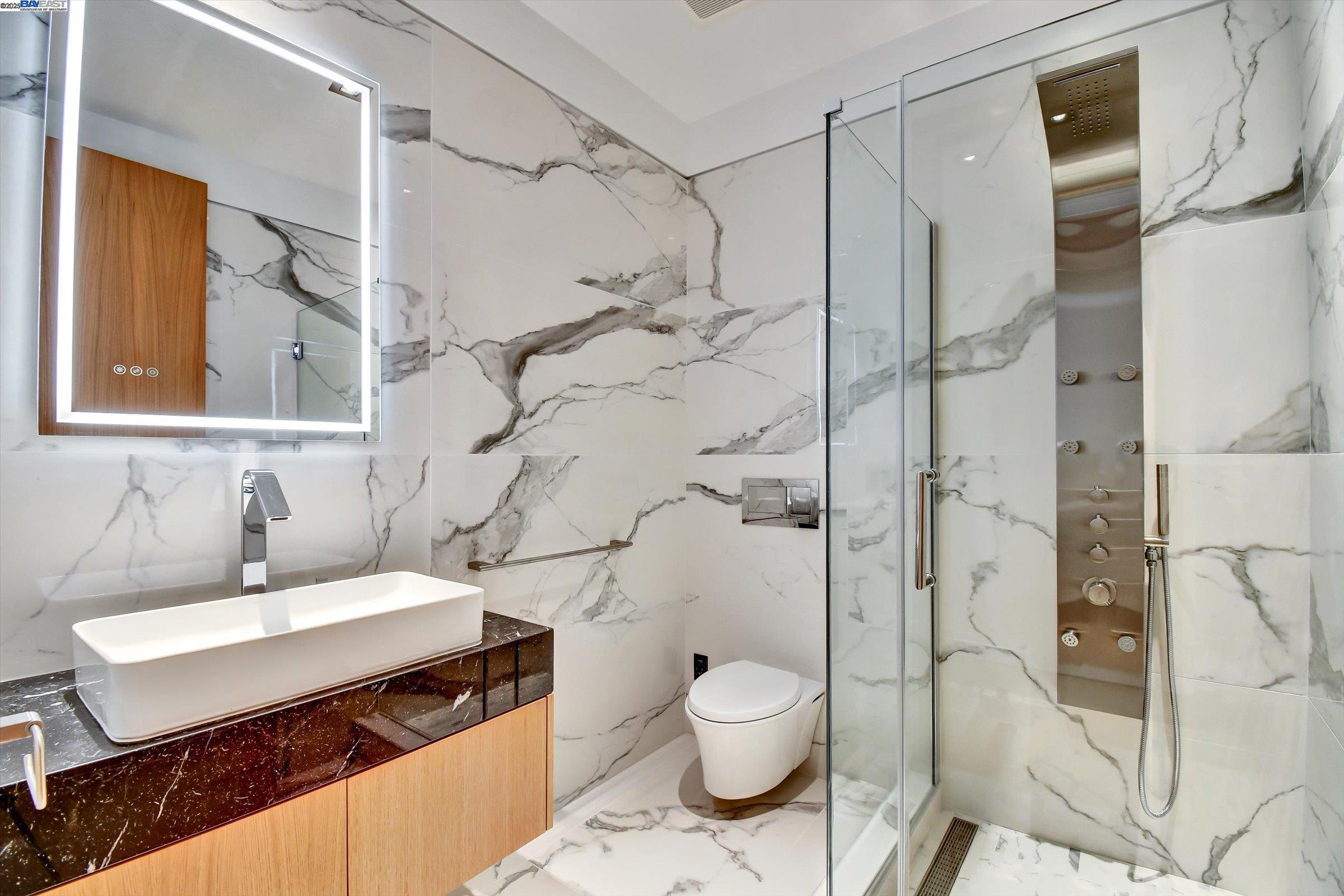 1208 Stanyan Street San Francisco, CA 94117 - Photo 21 of 60 a bathroom with a sink toilet and shower