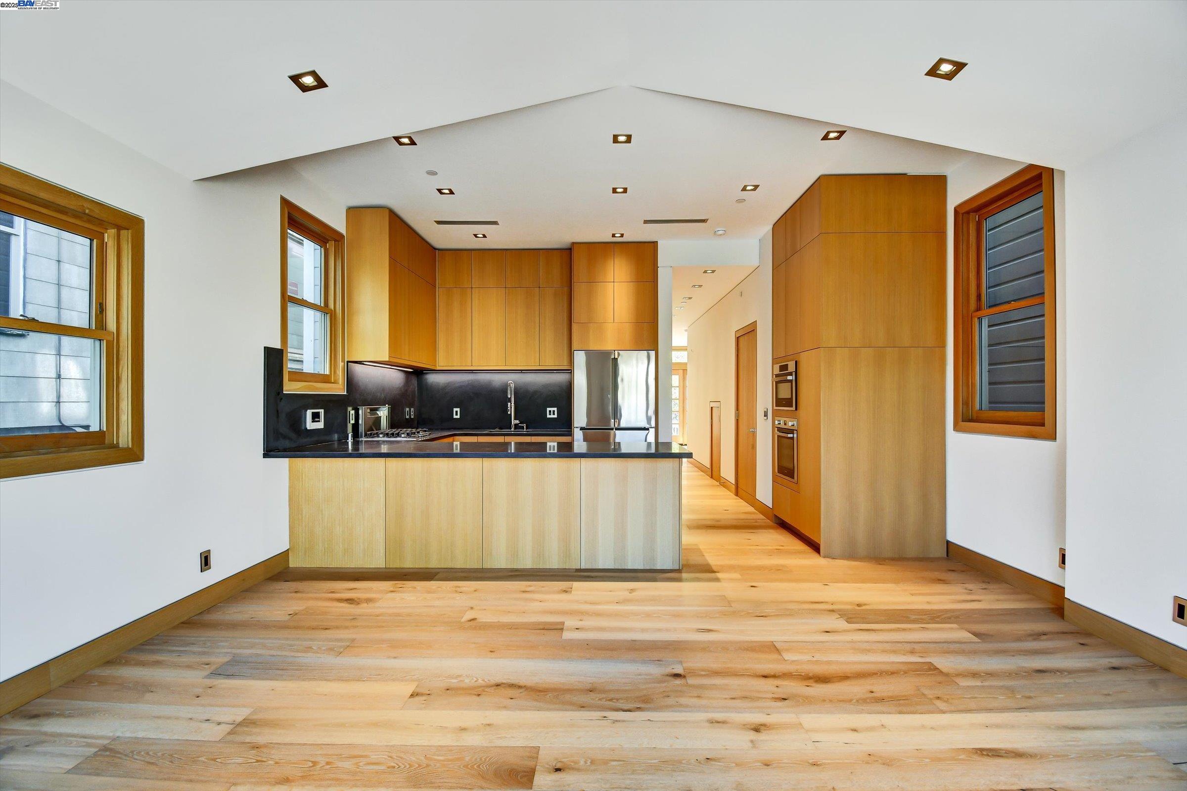 1208 Stanyan Street San Francisco, CA 94117 - Photo 28 of 60 a view of a living room with a wooden floor