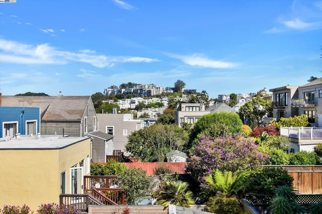 a bathroom with a toilet and shower