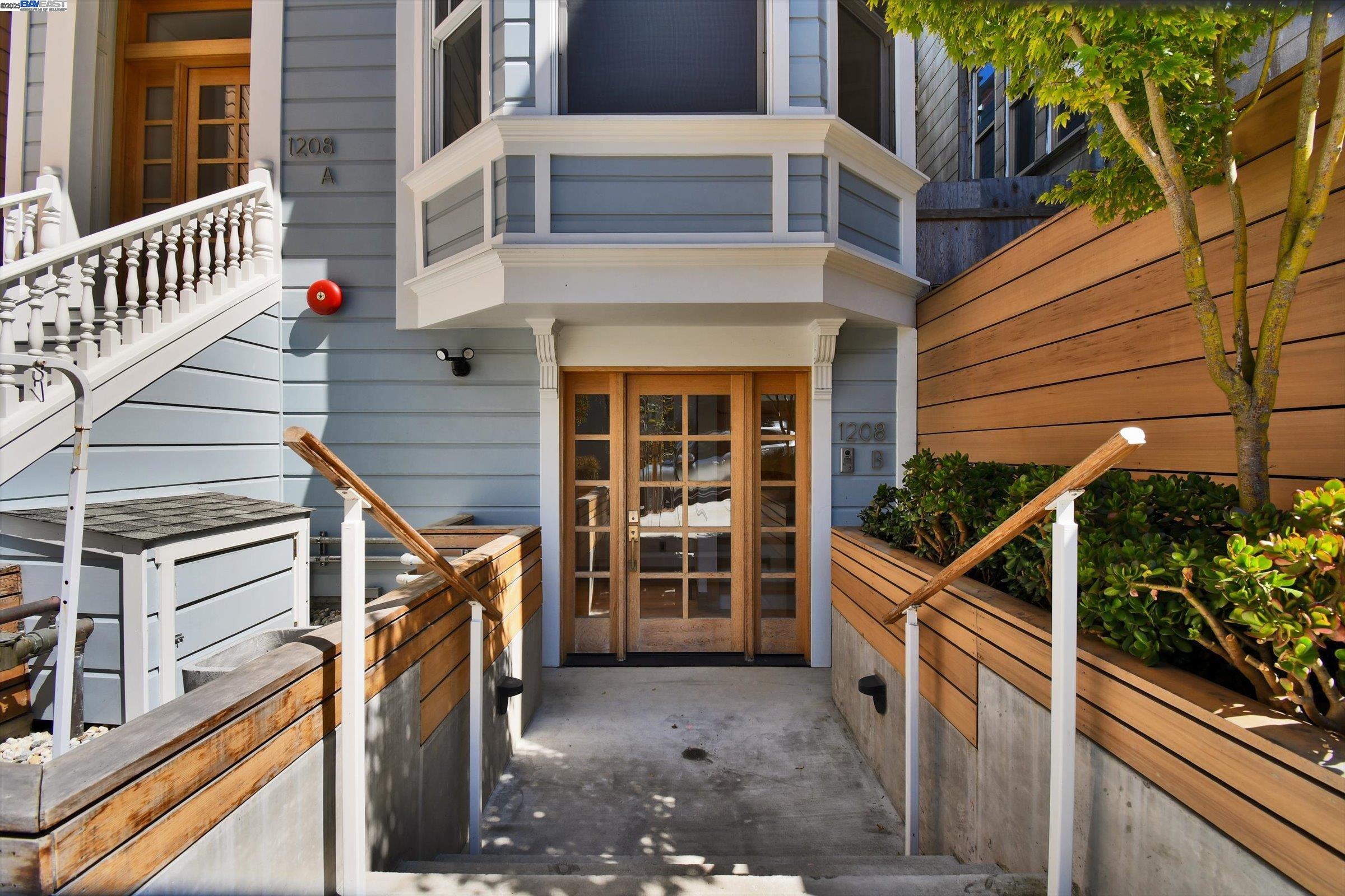 1208 Stanyan Street San Francisco, CA 94117 - Photo 4 of 60 a view of a house with a window