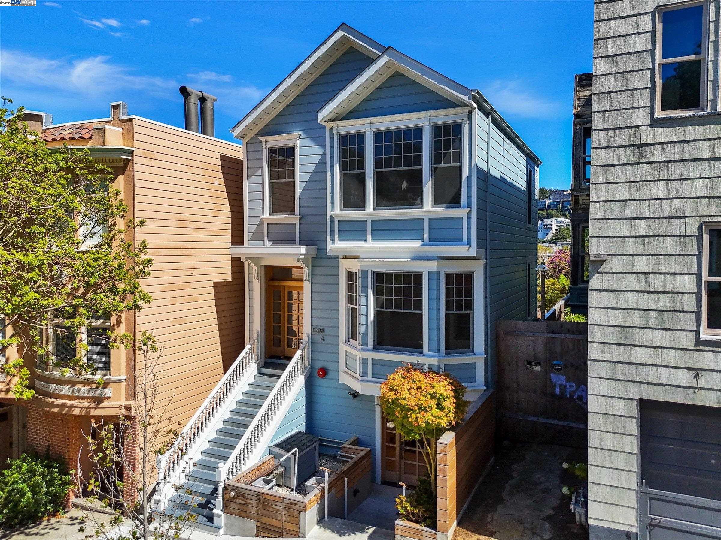1208 Stanyan Street San Francisco, CA 94117 - Photo 55 of 60 a front view of a house with outdoor seating