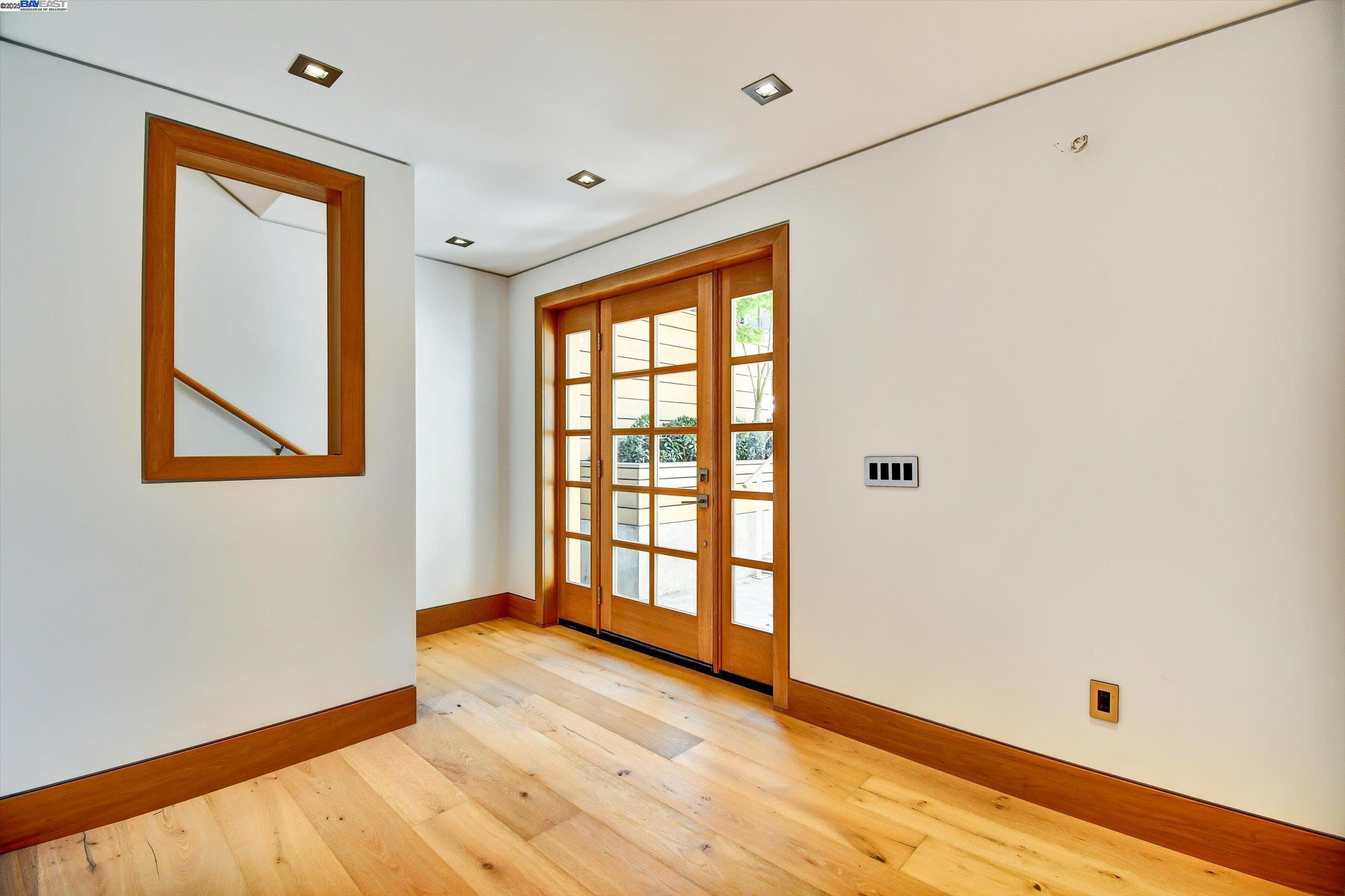 1208 Stanyan Street San Francisco, CA 94117 - Photo 7 of 60 a view of an empty room with glass door