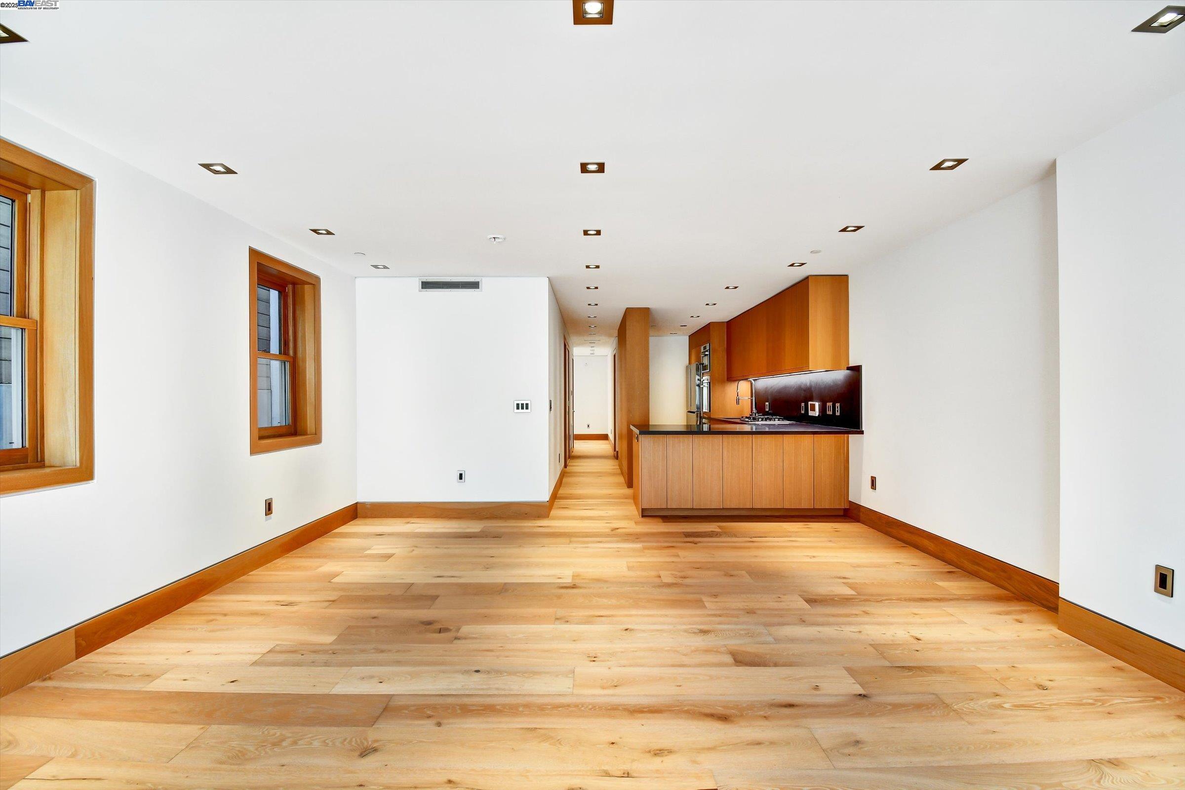 1208 Stanyan Street San Francisco, CA 94117 - Photo 9 of 60 a view of empty room with wooden floor