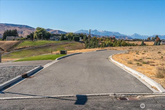 a view of a swimming pool with an ocean view
