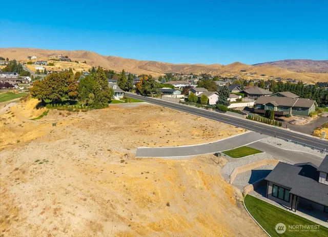 a view of a swimming pool with a lake view