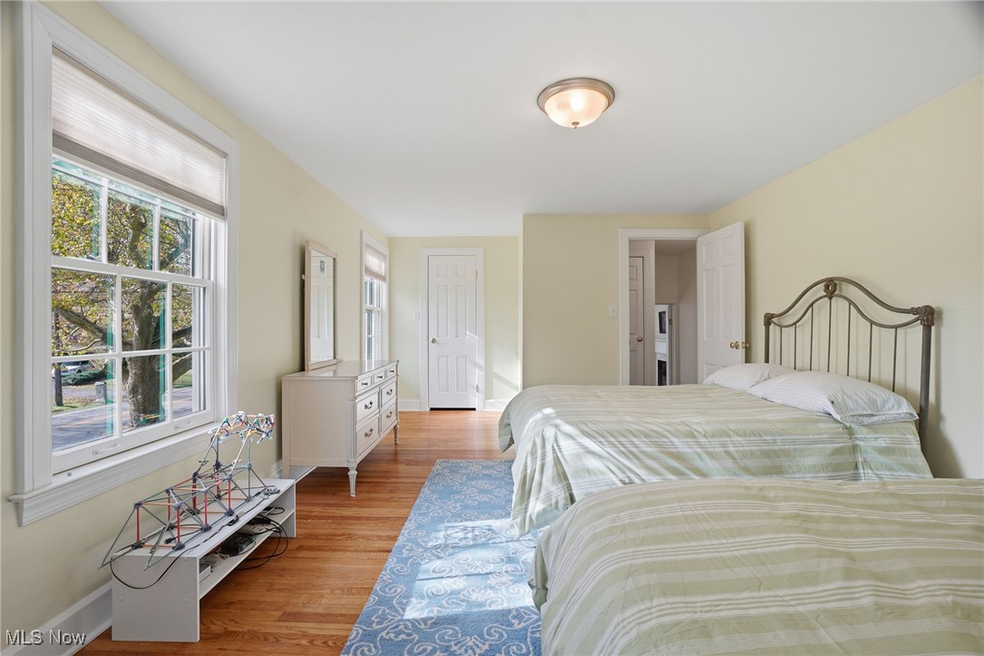 4441 Lake Road West Ashtabula, OH 44004 - Photo 27 of 46 Bedroom featuring light wood-style flooring and baseboards