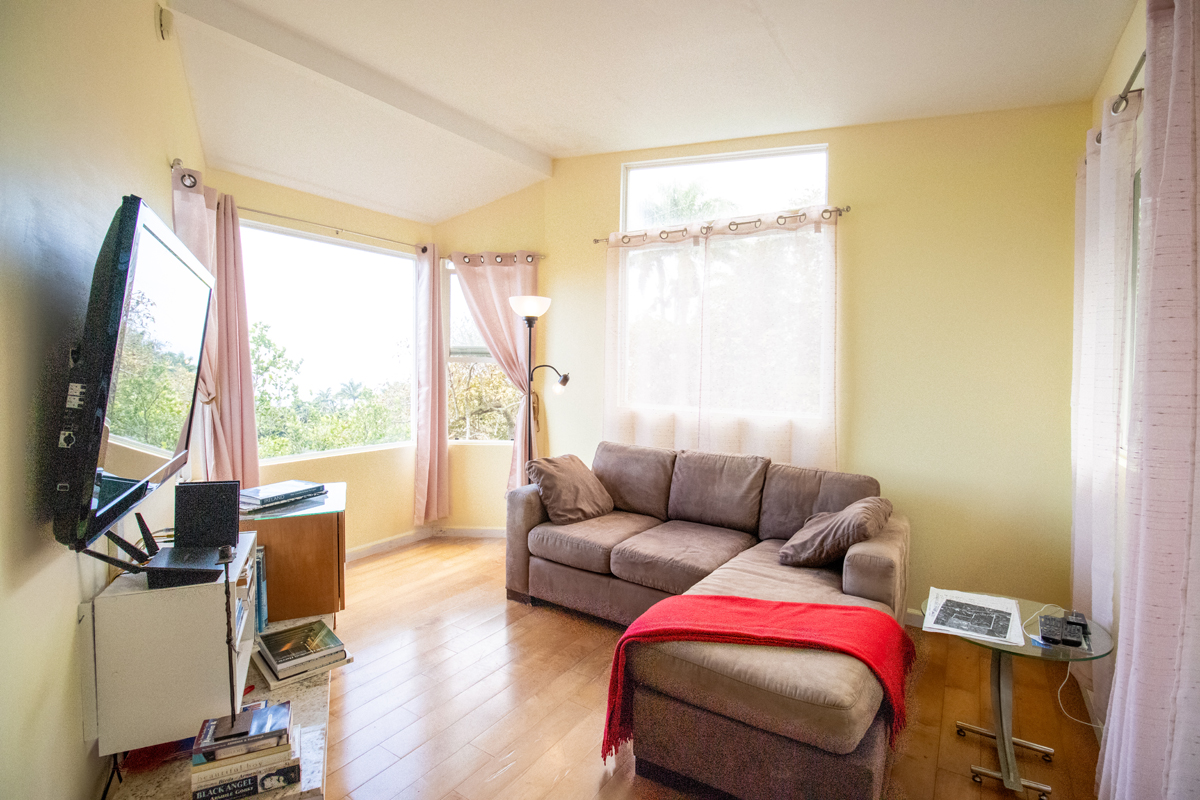 84-5063 Hawaii Belt Road Captain Cook, HI 96704 - Photo 17 of 30 a living room with furniture and a window