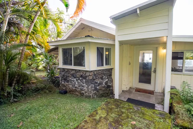 front view of a house with a small yard