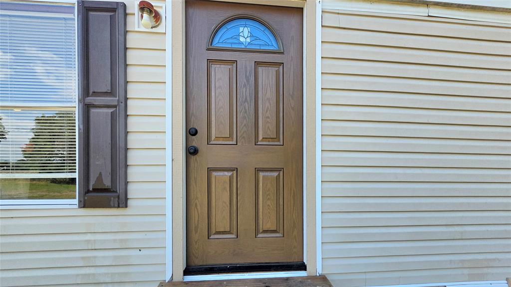 14628 Fm Road Scurry, TX 75158 - Photo 4 of 14 a view of an entryway of the house