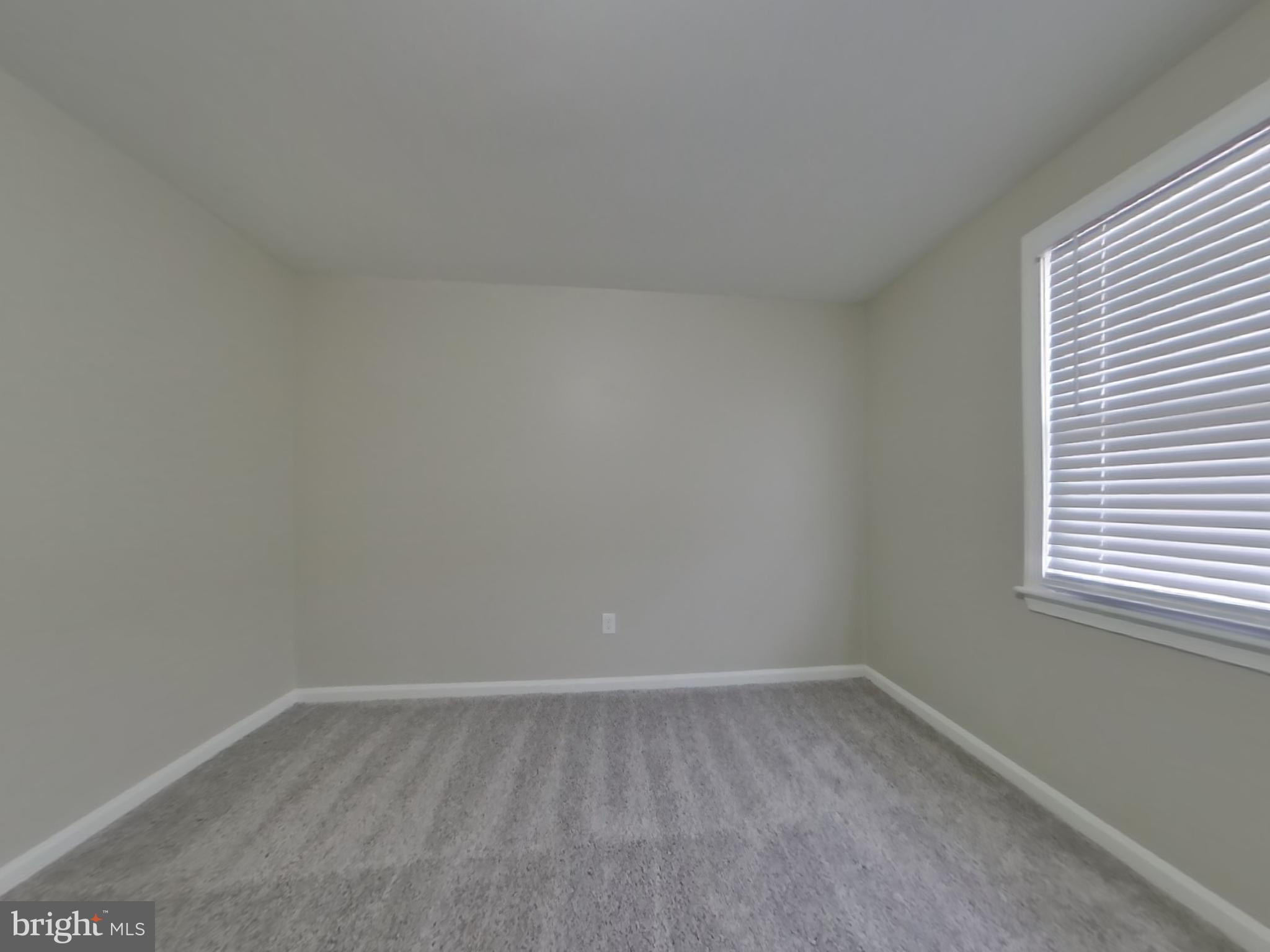 2000 Gaither Street Temple Hills, MD 20748 - Photo 11 of 21 a room that has a window in it