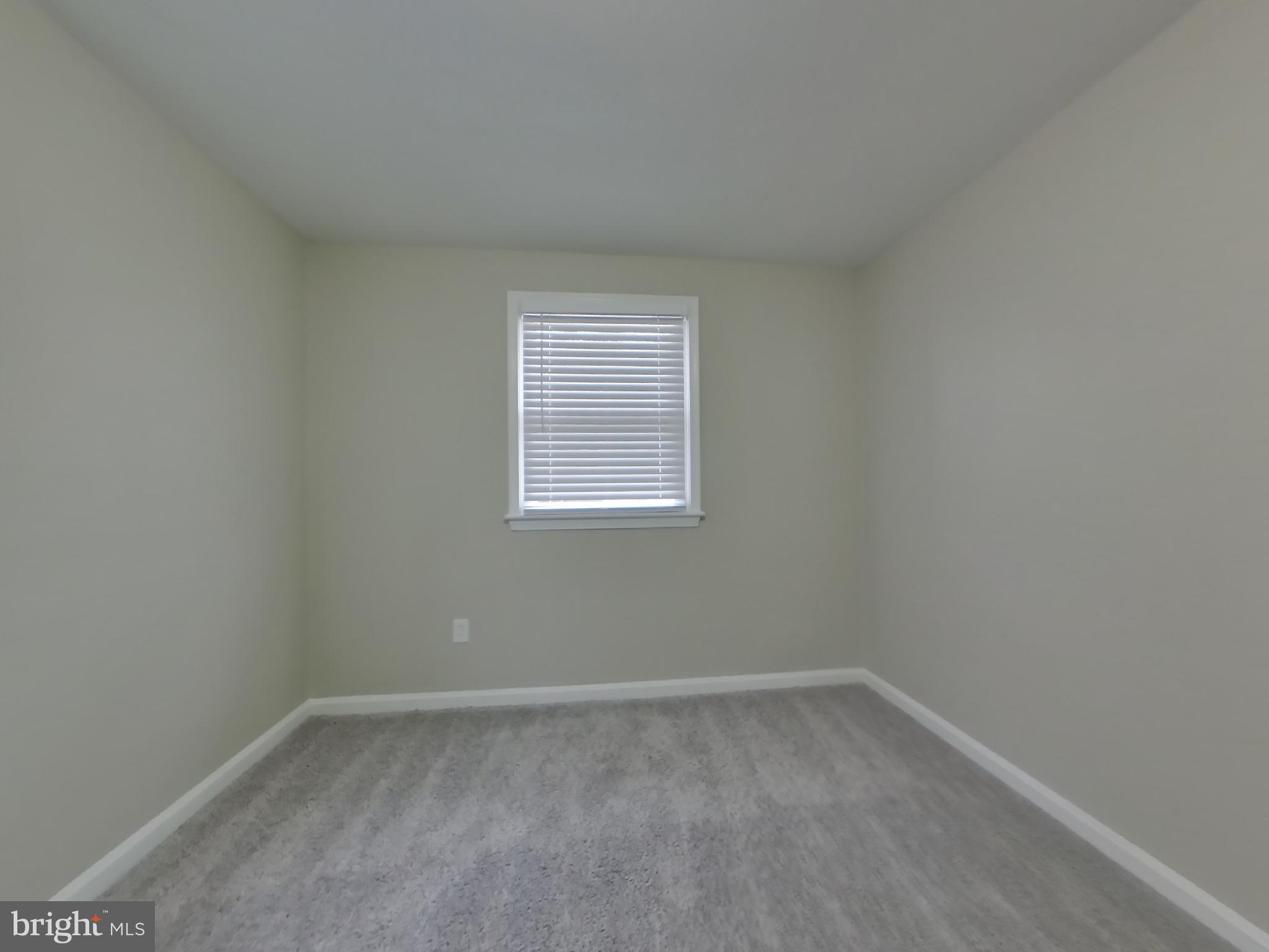 2000 Gaither Street Temple Hills, MD 20748 - Photo 10 of 21 an empty room with a window