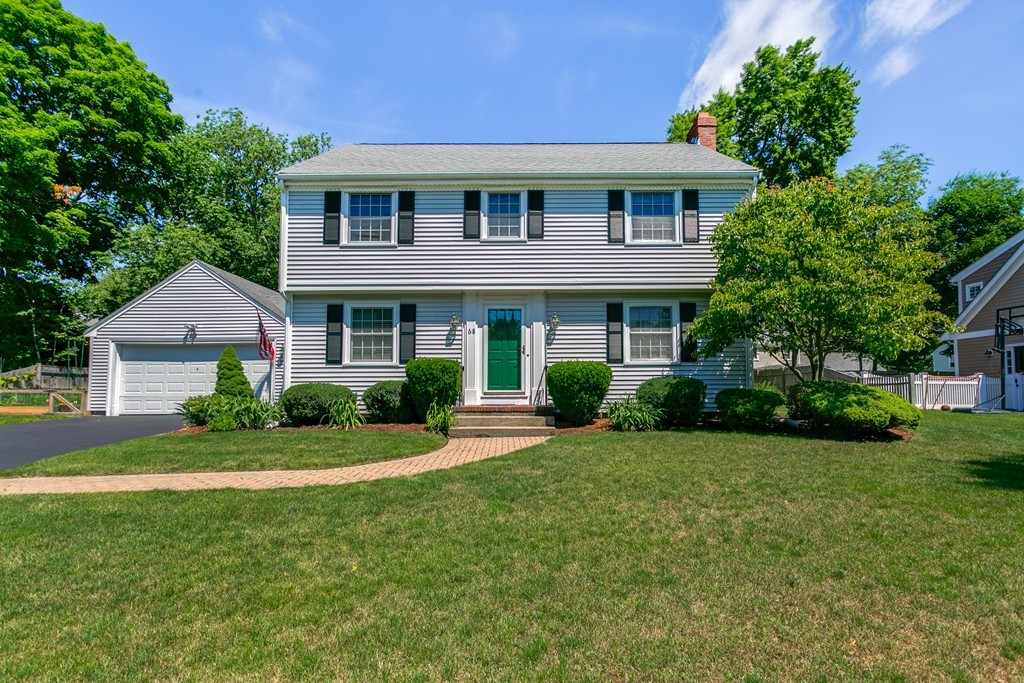 68 Chesterton Road Wellesley, MA 02481 - Photo 1 of 27 a front view of a house with a yard