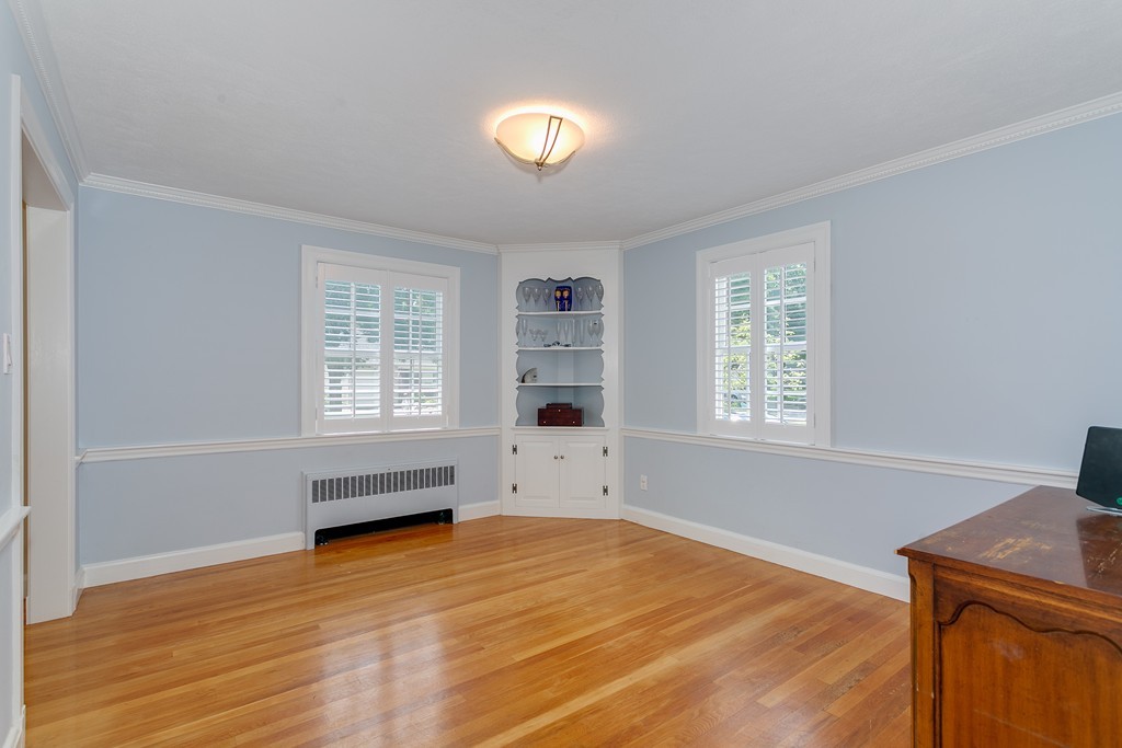 68 Chesterton Road Wellesley, MA 02481 - Photo 12 of 27 wooden floor in an empty room with a window