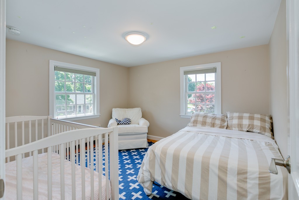 68 Chesterton Road Wellesley, MA 02481 - Photo 18 of 27 a bedroom with a bed and window
