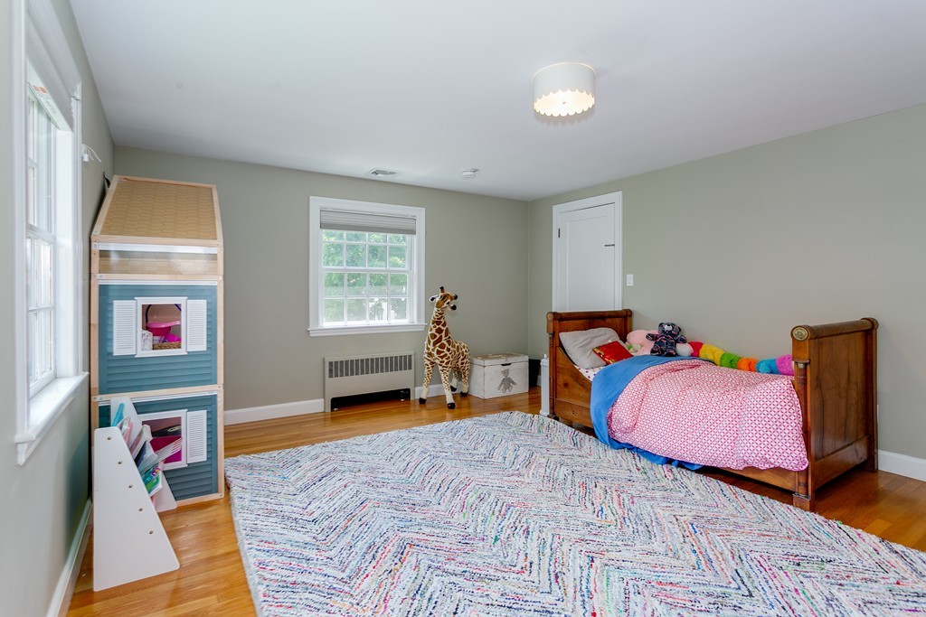 68 Chesterton Road Wellesley, MA 02481 - Photo 19 of 27 a bedroom with bed and a window