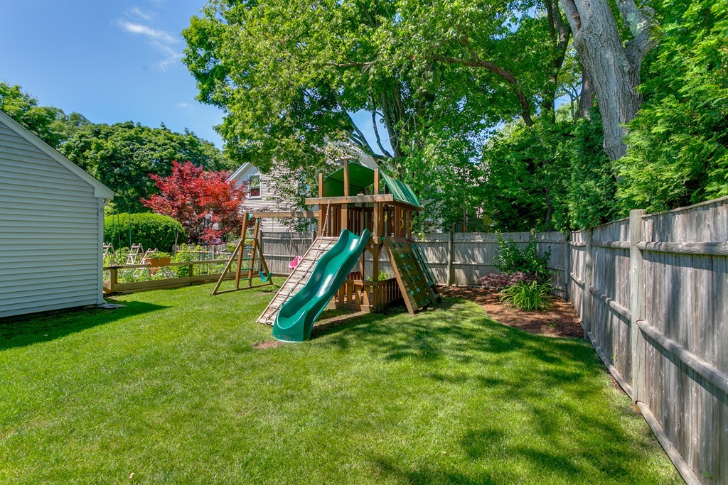 68 Chesterton Road Wellesley, MA 02481 - Photo 2 of 27 a view of a house with a park