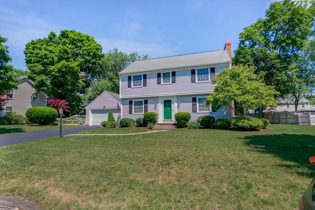 68 Chesterton Road Wellesley, MA 02481 - Photo 22 of 27 a front view of a house with garden