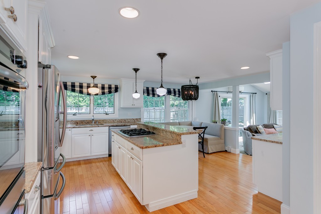 68 Chesterton Road Wellesley, MA 02481 - Photo 5 of 27 a kitchen with sink refrigerator and stove