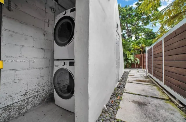 a view of a building with a yard