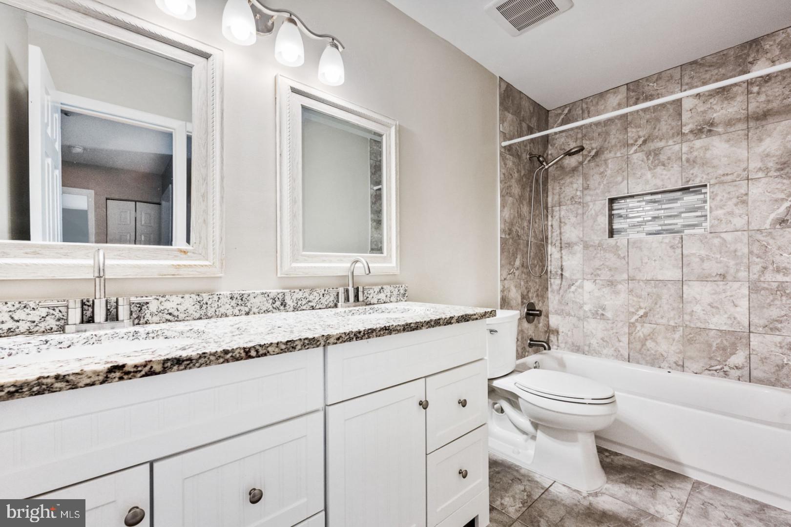 9575 Farewell Road Columbia, MD 21045 - Photo 3 of 21 Modern elegance in a serene bathroom.
