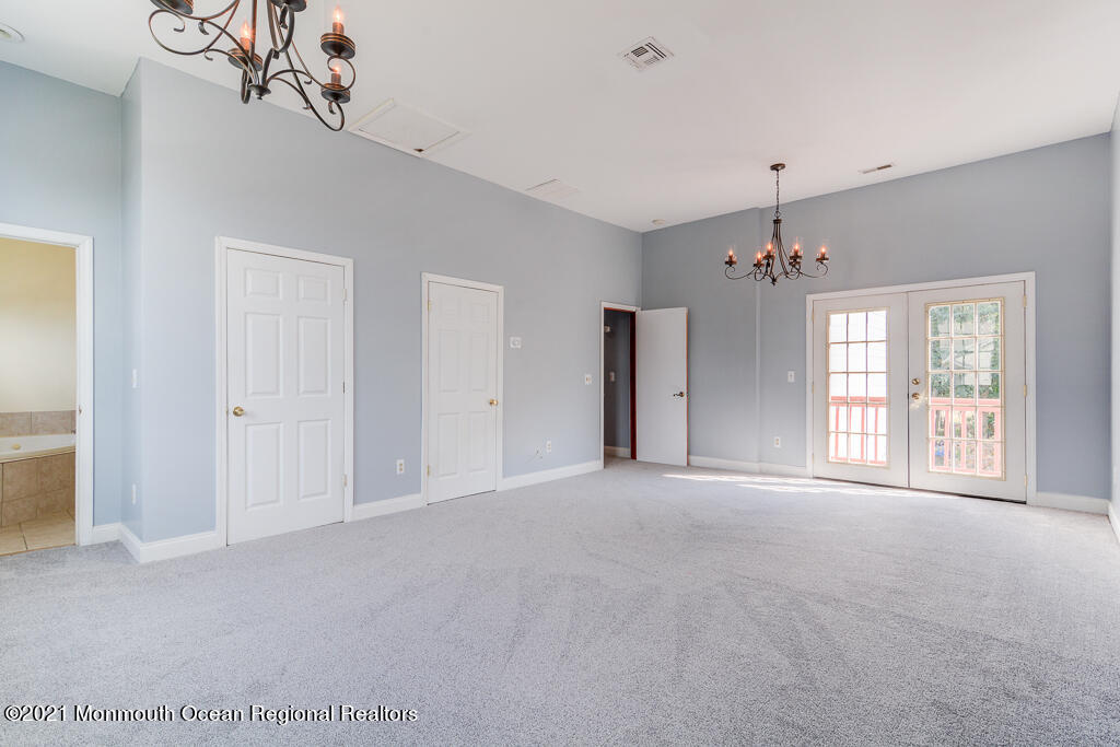 313 Emberly Road Brick, NJ 08723 - Photo 19 of 32 a view of an empty room with a window