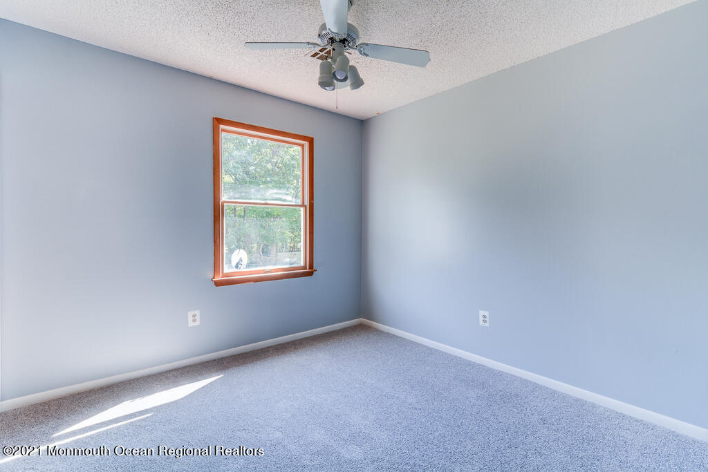313 Emberly Road Brick, NJ 08723 - Photo 24 of 32 a view of an empty room with a window