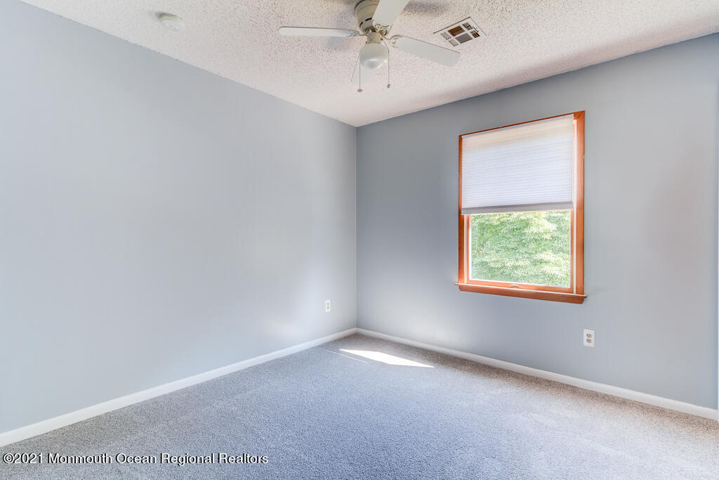 313 Emberly Road Brick, NJ 08723 - Photo 25 of 32 an empty room with a window