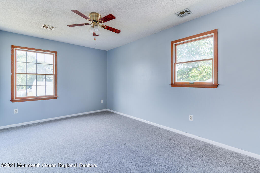 313 Emberly Road Brick, NJ 08723 - Photo 26 of 32 a view of an empty room with a window