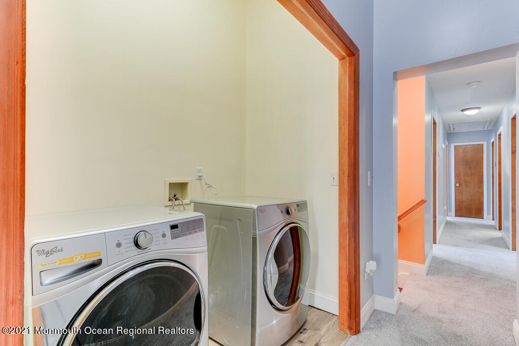 313 Emberly Road Brick, NJ 08723 - Photo 28 of 32 a view of entryway with washer and dryer