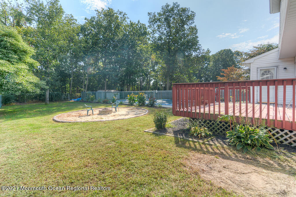 313 Emberly Road Brick, NJ 08723 - Photo 29 of 32 a view of a swimming pool with a patio