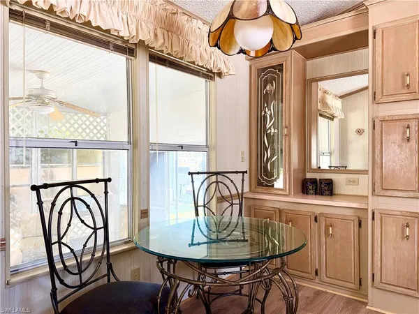 a kitchen with stainless steel appliances a refrigerator sink and microwave