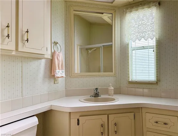 a bathroom with a tub and shower