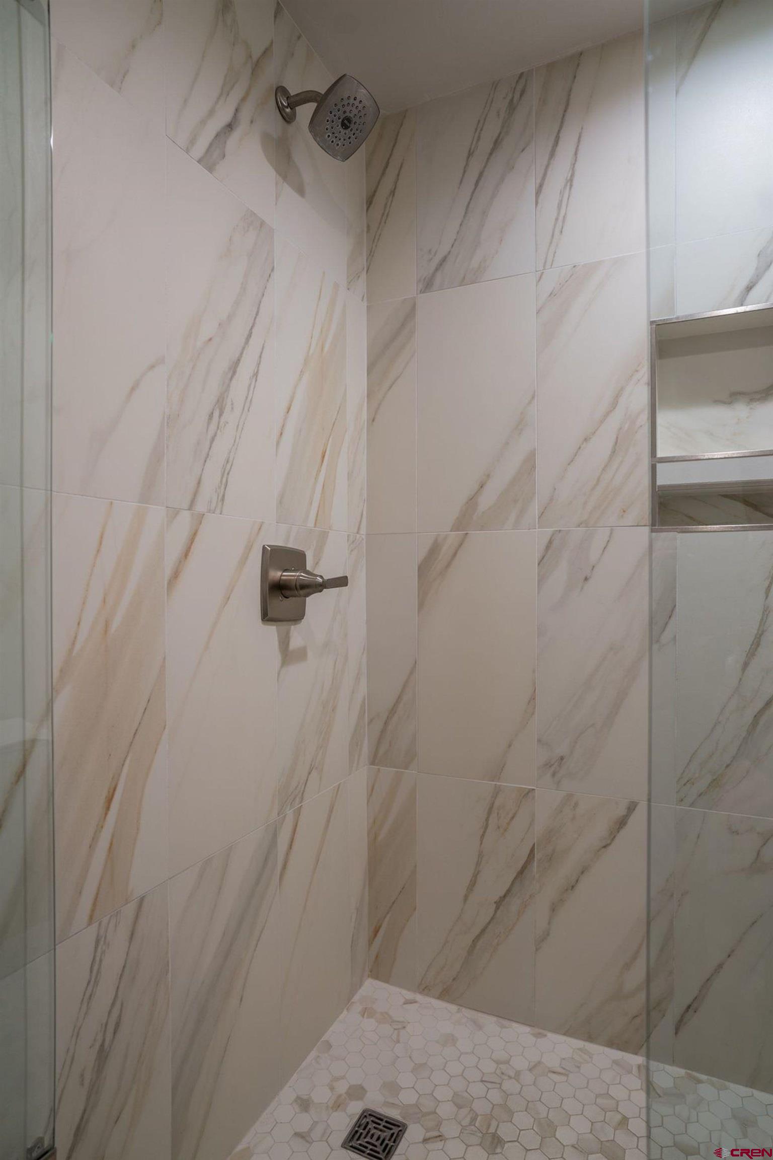 314 Tamarron Drive, Unit 342 Durango, CO 81301 - Photo 14 of 17 a bathroom with a shower