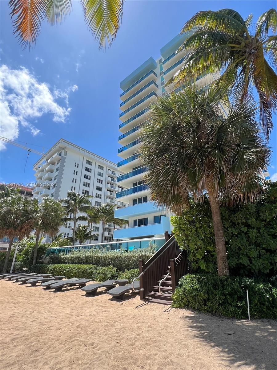 9172 Collins Avenue, Unit 214 Surfside, FL 33154 - Photo 28 of 33 a front view of a multi story building