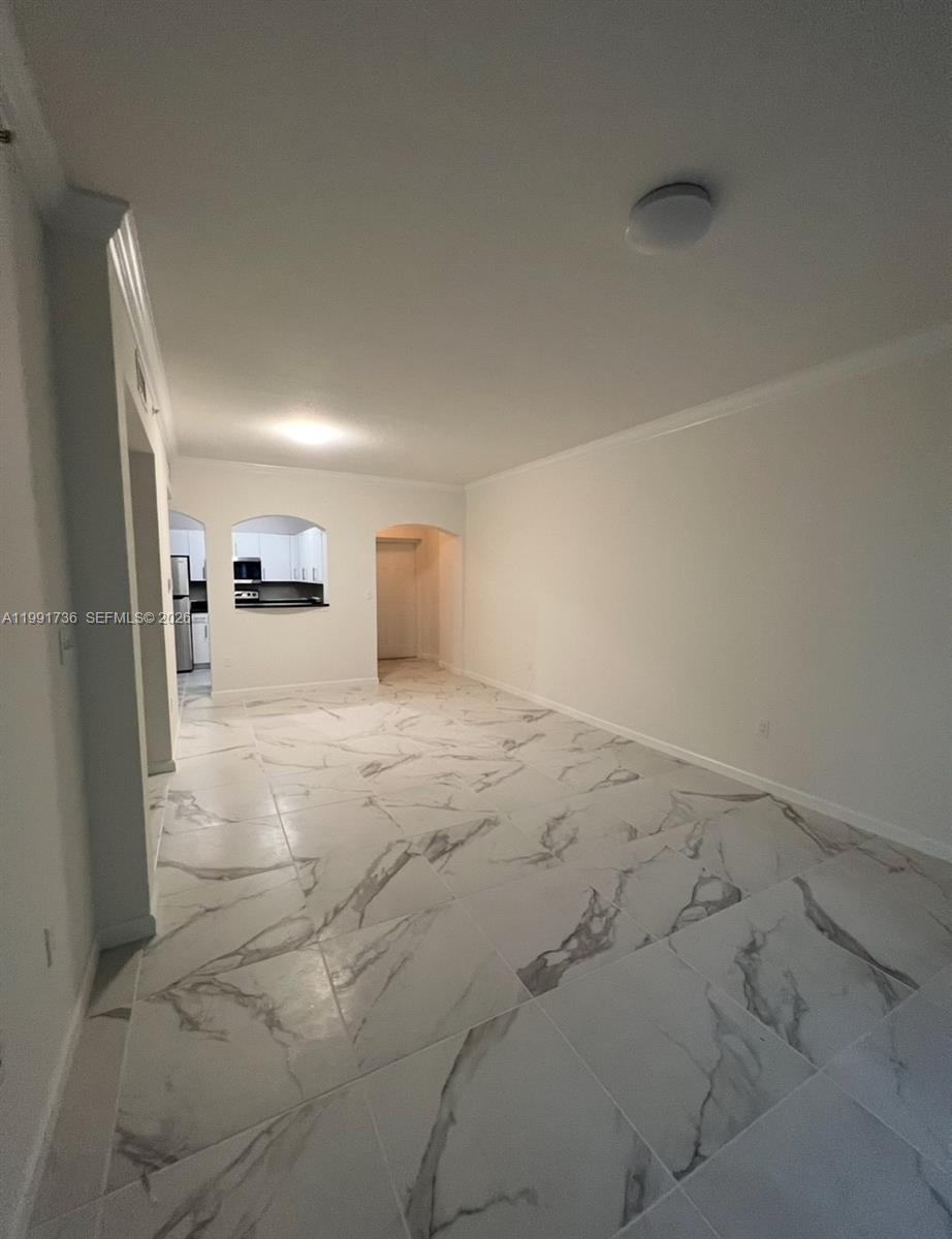 9172 Collins Avenue, Unit 214 Surfside, FL 33154 - Photo 8 of 33 a view of empty room