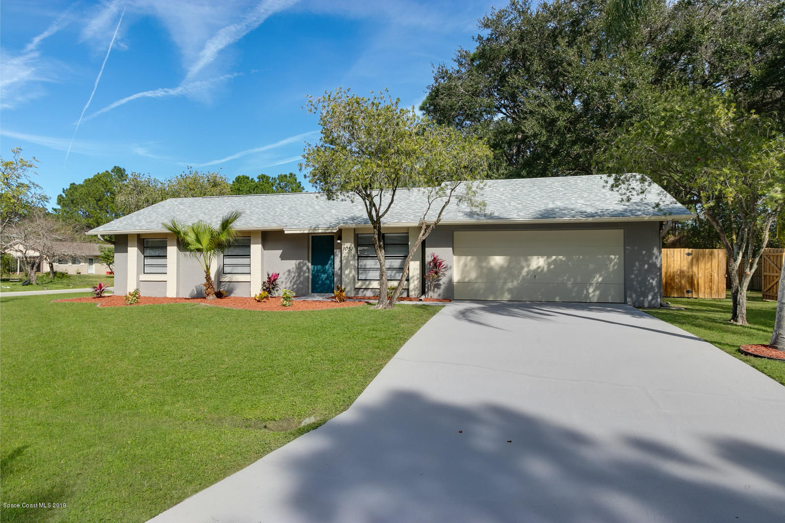 1051 Cherokee Road Southeast Palm Bay, FL 32909 - Photo 3 of 23 03_1051Cherokee8025Edit_mls