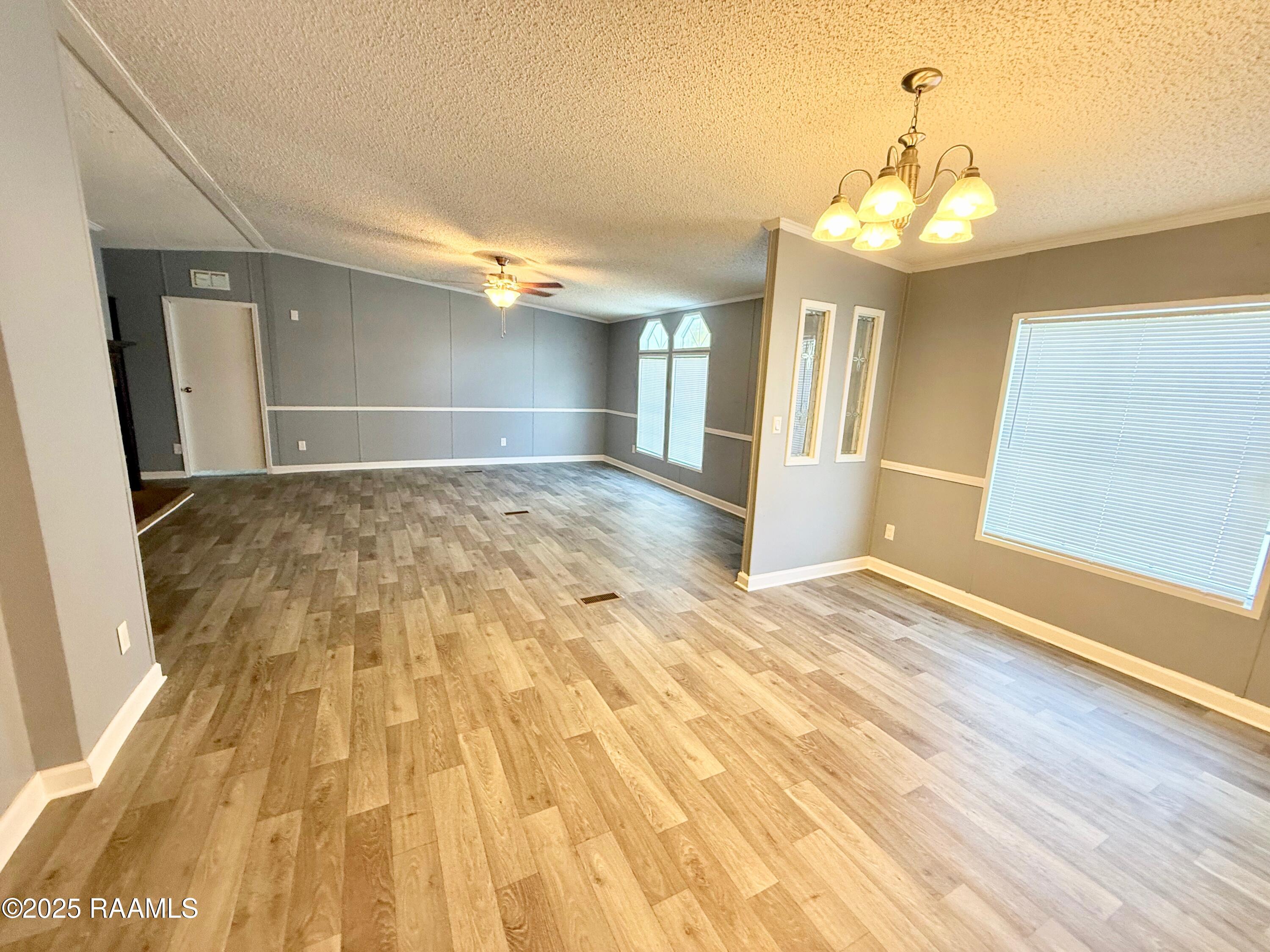 2900 Loreauville Road, Unit 1 New Iberia, LA 70563 - Photo 18 of 48 living room/dining area