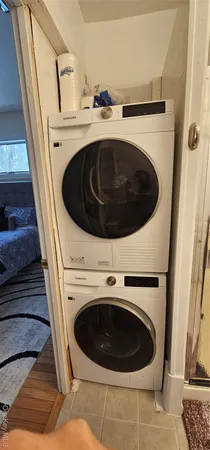 a utility room with dryer and washer