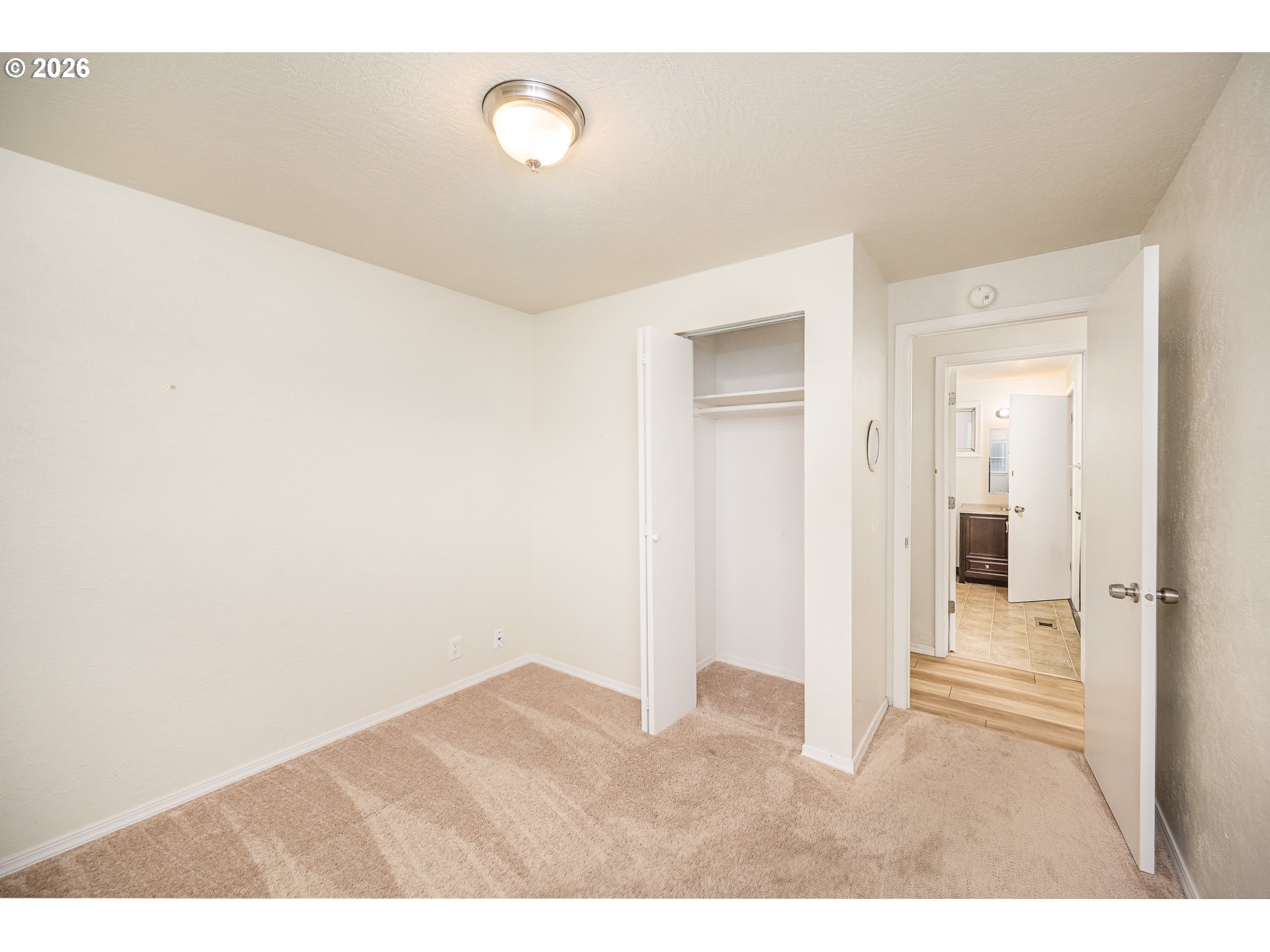 425 Autumn Avenue Eugene, OR 97404 - Photo 18 of 40 a view of a hallway with wooden floor