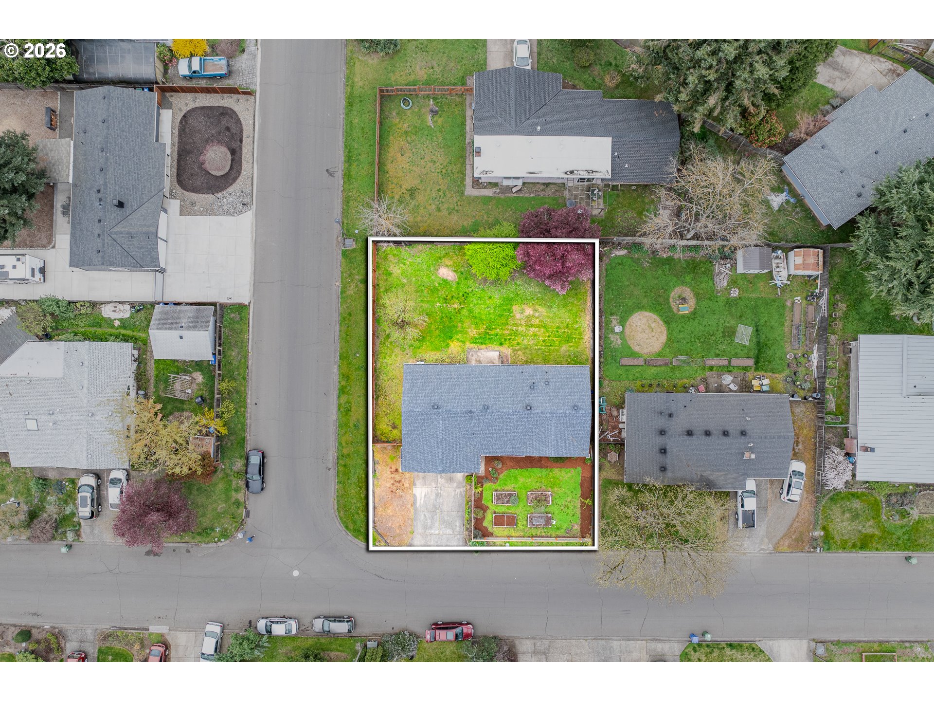 425 Autumn Avenue Eugene, OR 97404 - Photo 24 of 40 an aerial view of a house with garden space and a car park in front