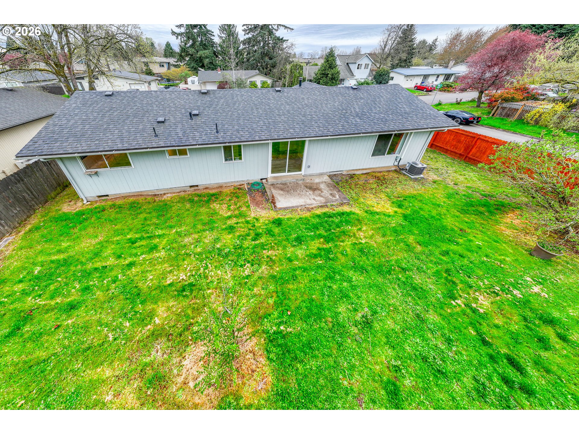 425 Autumn Avenue Eugene, OR 97404 - Photo 33 of 40 a aerial view of a house with swimming pool and a yard