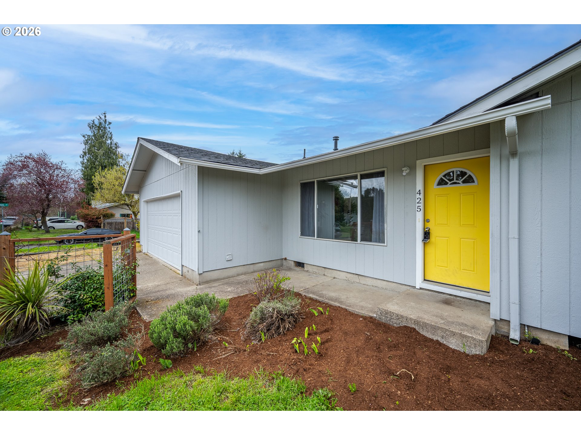 425 Autumn Avenue Eugene, OR 97404 - Photo 37 of 40 a view of a big room with potted plants and wooden fence