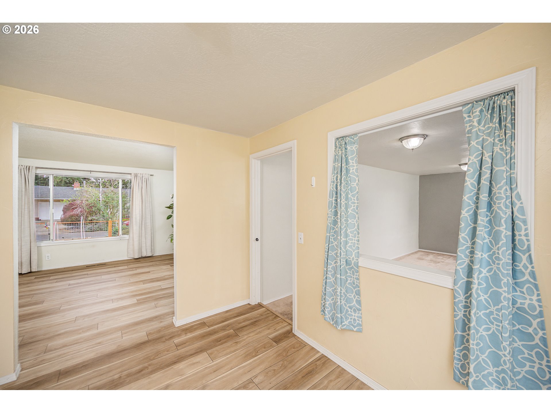 425 Autumn Avenue Eugene, OR 97404 - Photo 10 of 40 a view of an empty room and wooden floor