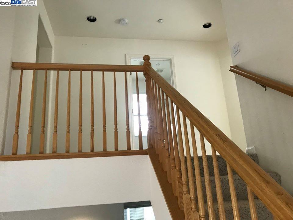 2173 Leafcrest Common Livermore, CA 94551 - Photo 14 of 25 a view of staircase with railing and white walls