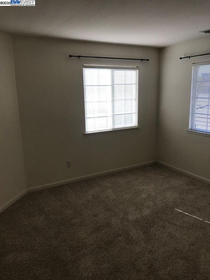 2173 Leafcrest Common Livermore, CA 94551 - Photo 15 of 25 an empty room with a window