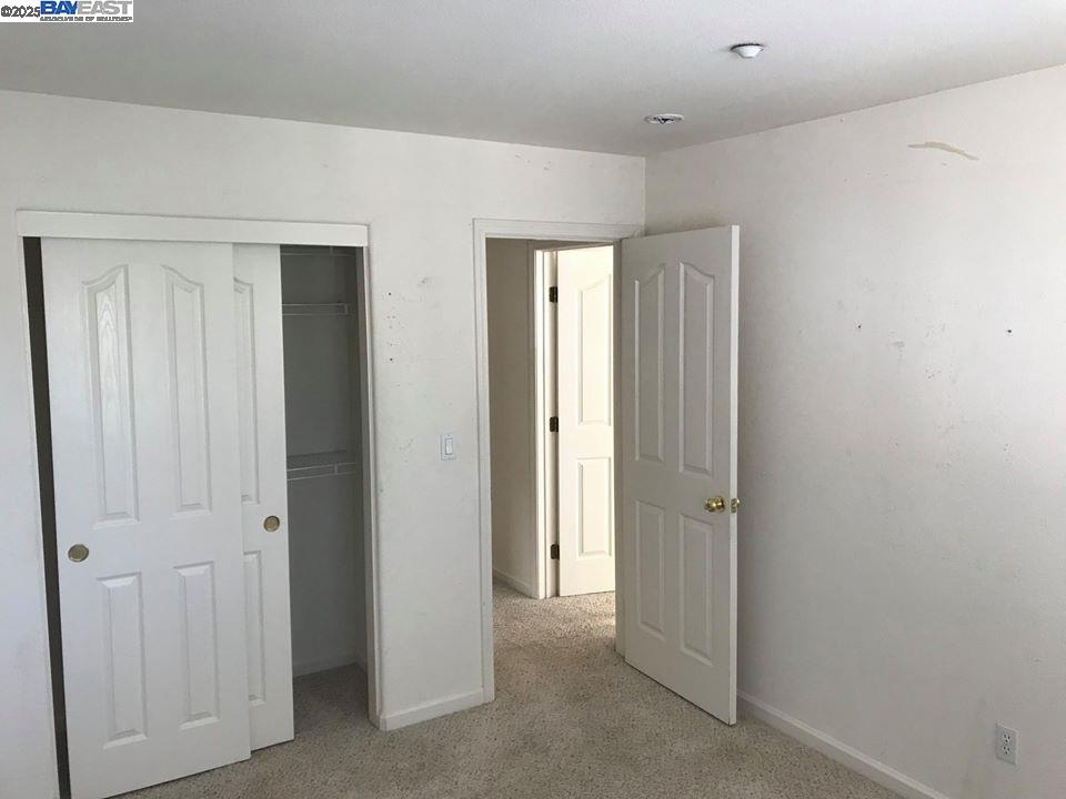 2173 Leafcrest Common Livermore, CA 94551 - Photo 16 of 25 a view of a hallway with closet area