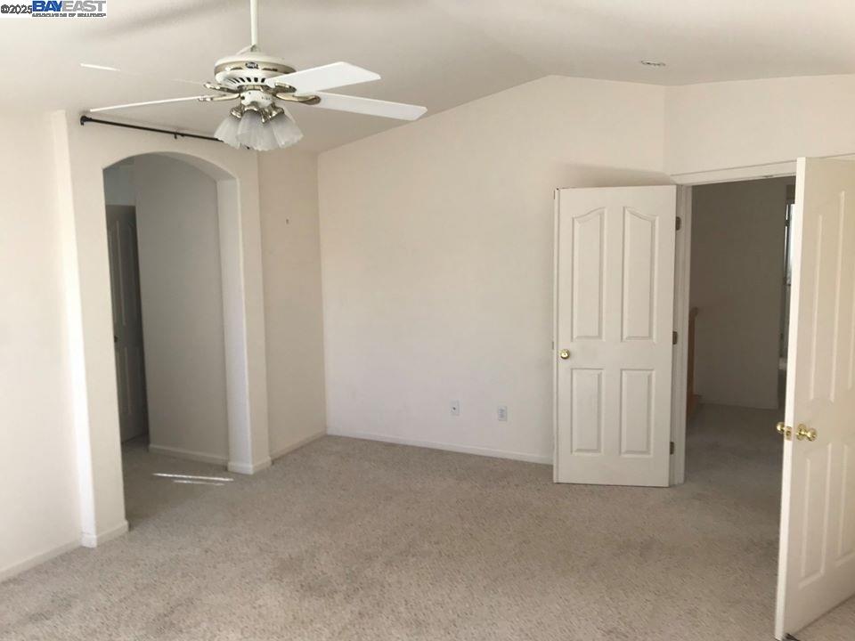 2173 Leafcrest Common Livermore, CA 94551 - Photo 20 of 25 a view of a livingroom with a chandelier fan