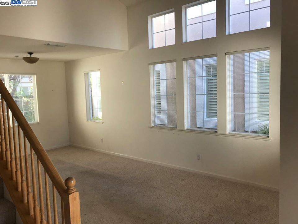 2173 Leafcrest Common Livermore, CA 94551 - Photo 3 of 25 an empty room with windows