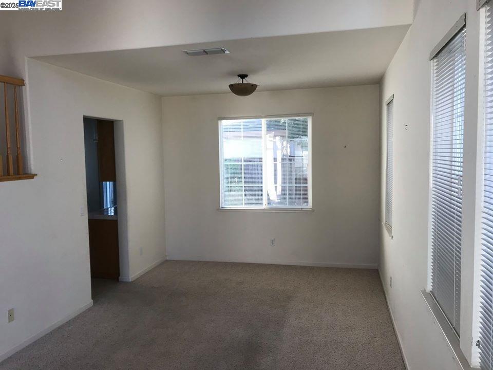 2173 Leafcrest Common Livermore, CA 94551 - Photo 4 of 25 an empty room with a window