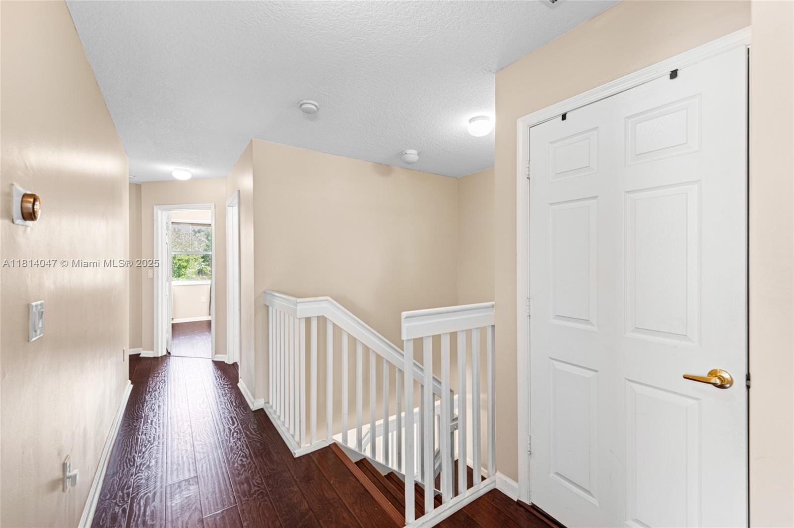 16316 Southwest 48th Street Miramar, FL 33027 - Photo 23 of 37 a view of hallway with wooden floor